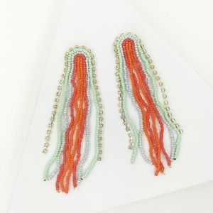 Bead and Rhinestone Arc Tassel Earrings in Coral